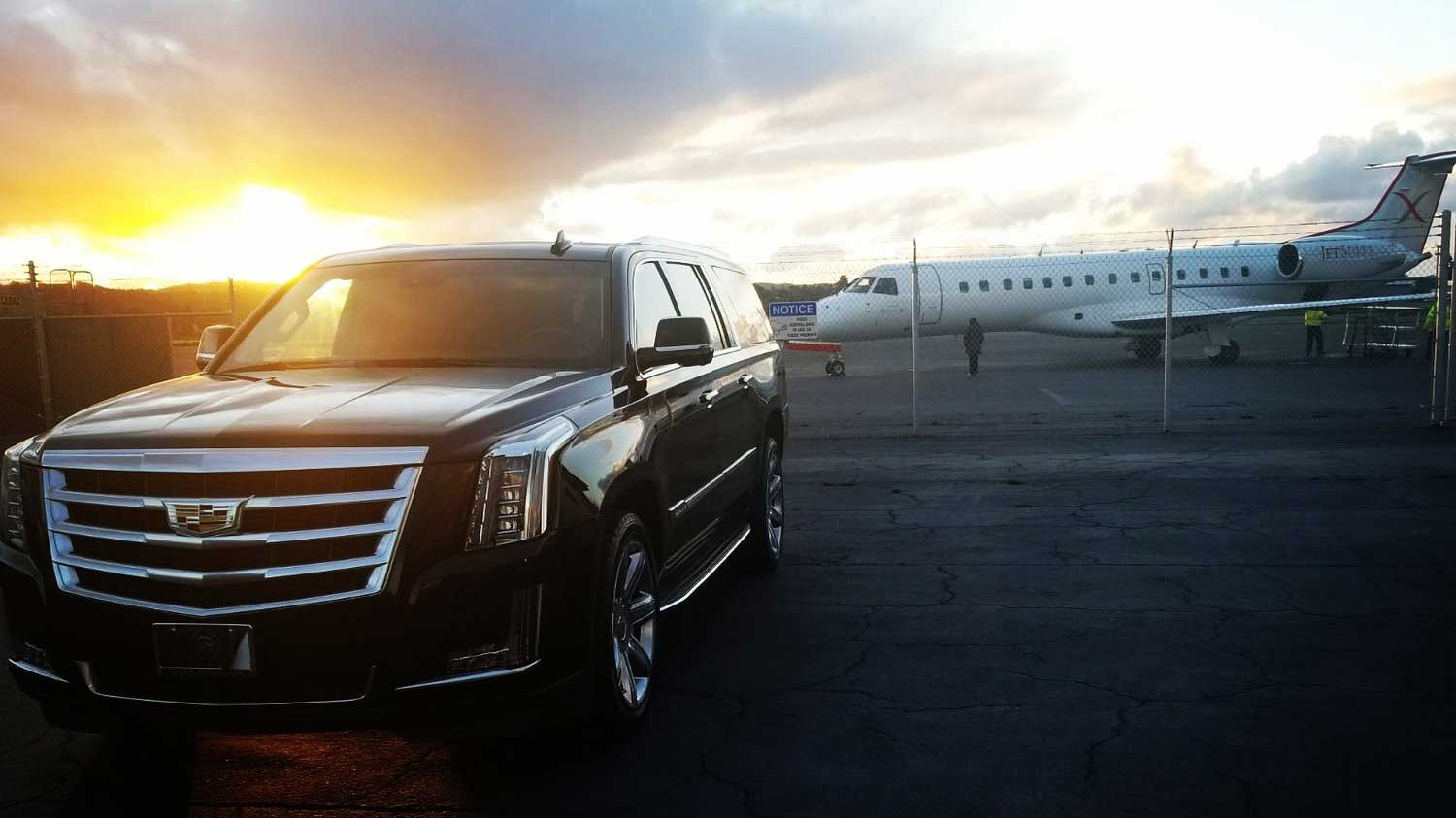 Luxury black SUV limousine ready for service on Maui